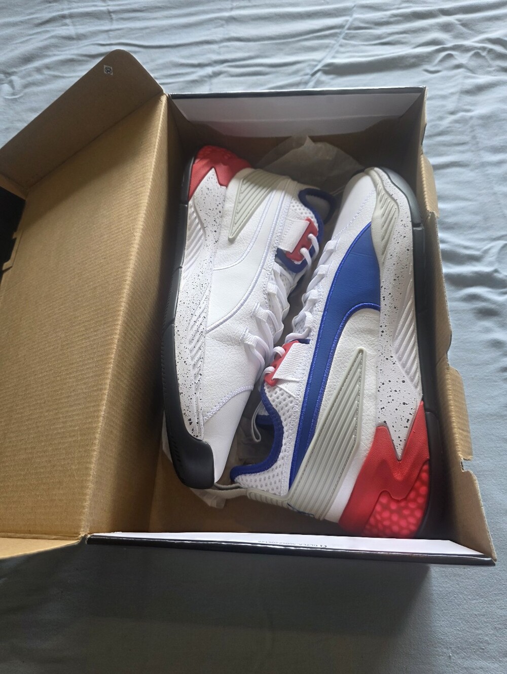 Men's Performance Sneakers - White with Blue & Red Accents Puma.